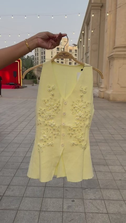 Load video: Voxelle Butter Yellow Floral Embellished Sleeveless Top